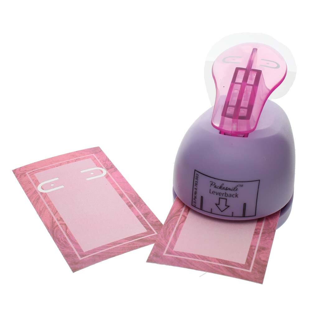 Pink paper punch with two pink punching sheets on a white background