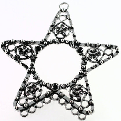 Decorative star-shaped object with intricate patterns on a white background