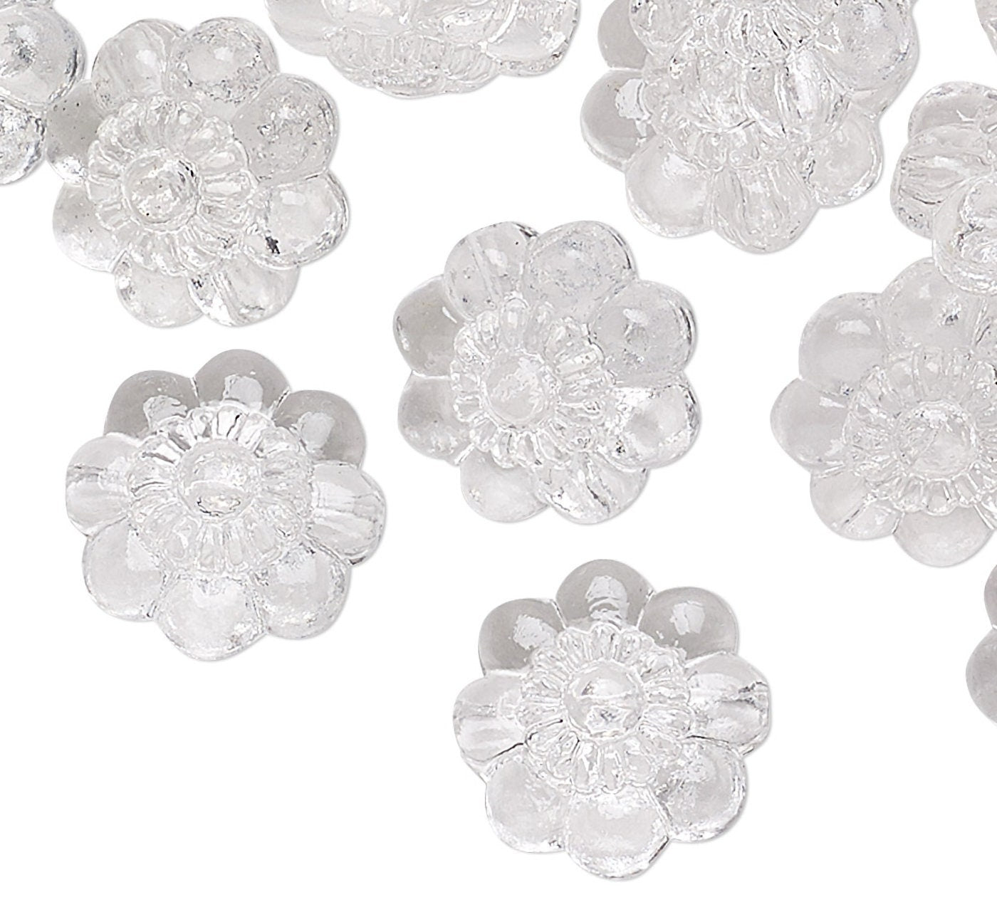 Clear flower-shaped beads on a white background