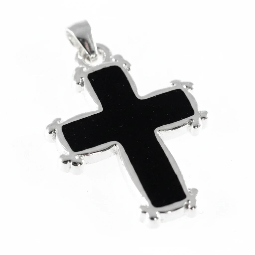 A sterling silver cross pendant with a glossy black enamel center, shown on a plain light background.