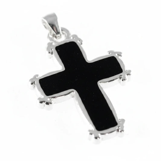 A sterling silver cross pendant with a glossy black enamel center, shown on a plain light background.