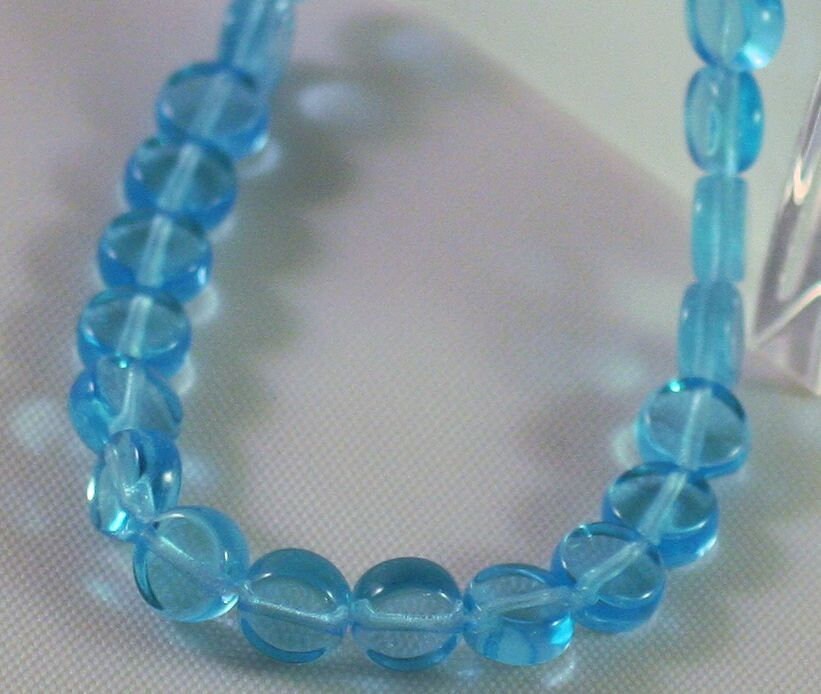 Blue beads on a light background