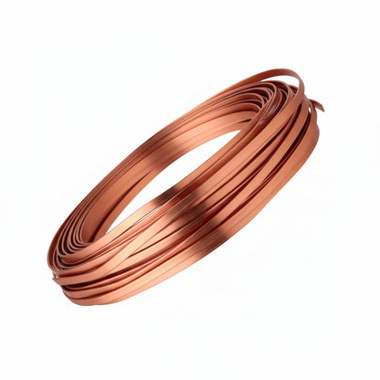 Coiled copper wire on a white background