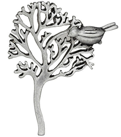 Silver  tree design and a bird perched on a branch.