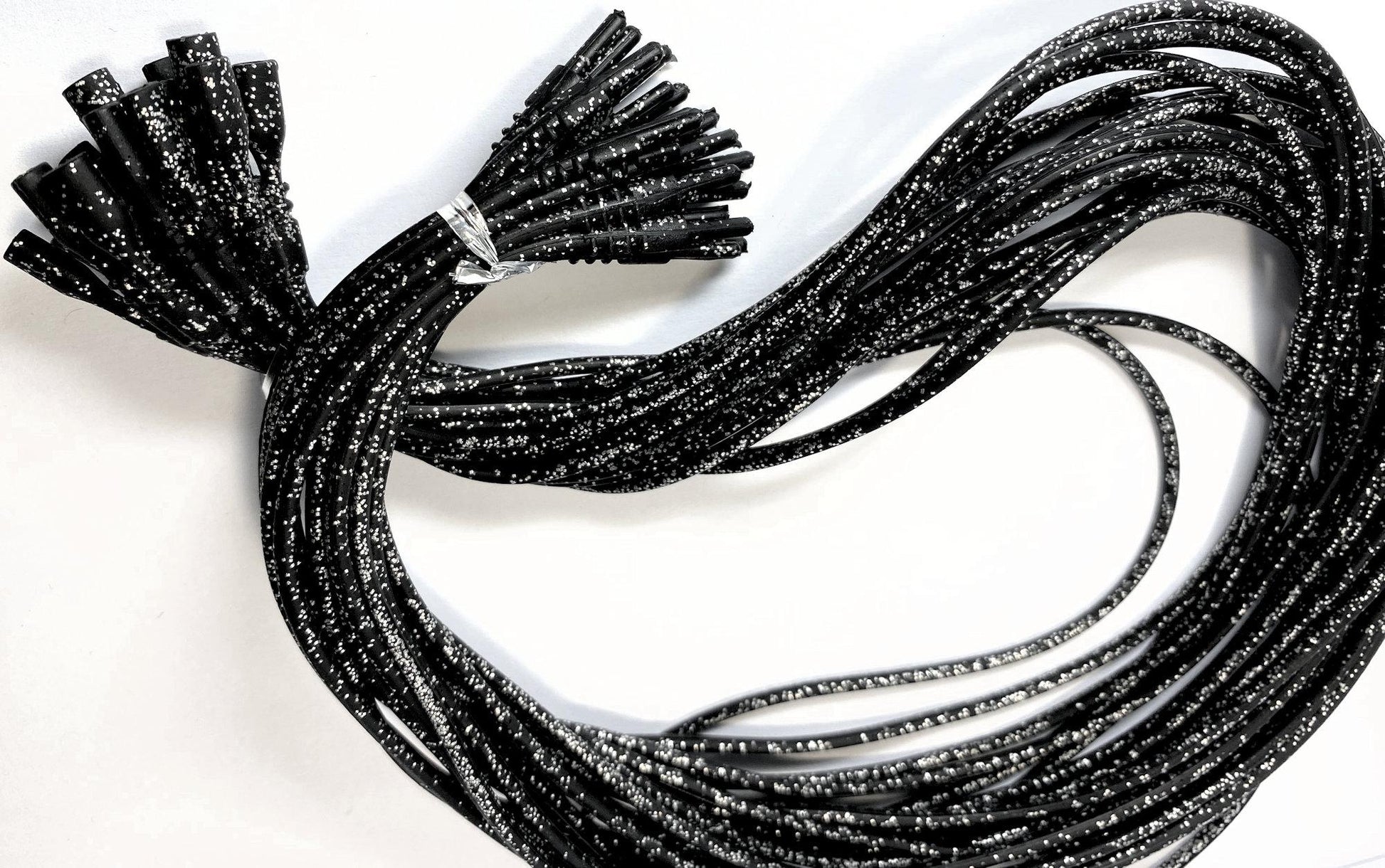 Black cords on a white background