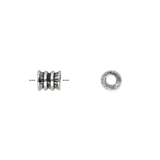 A silver-toned metal spacers bead shown from two angles: a side view with a dashed line indicating its width, and a top-down circular view, on a plain white background.