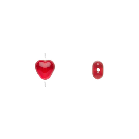 Two small glossy red beads on a plain white background, one heart-shaped bead with a dashed measurement guide and one oval bead.