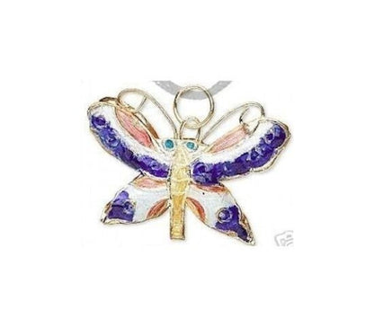 A butterfly-shaped jewelry charm with purple, white, and pink enamel wings, a gold body, and small blue and green jewel accents, shown on a plain white background.