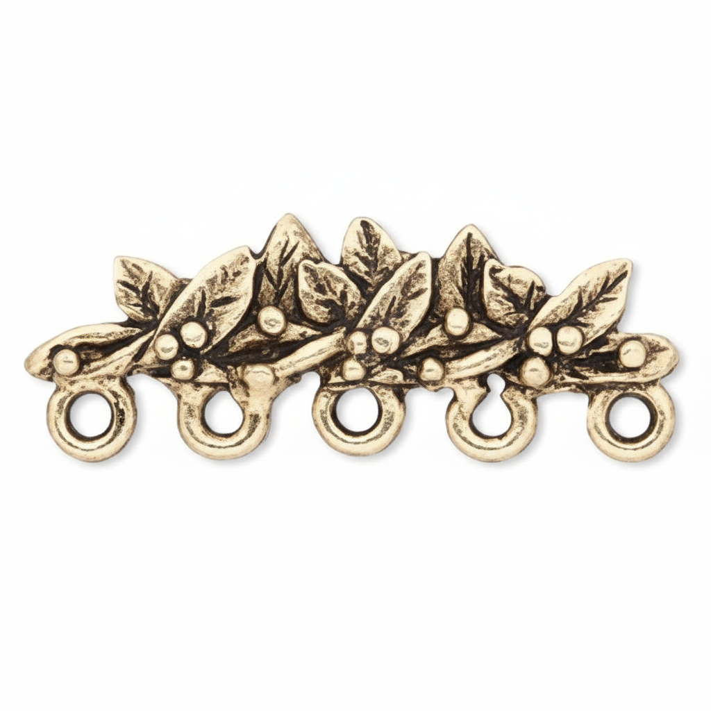 An antique gold-toned metal holly branch charm with five hanging loops, shown on a plain white background.