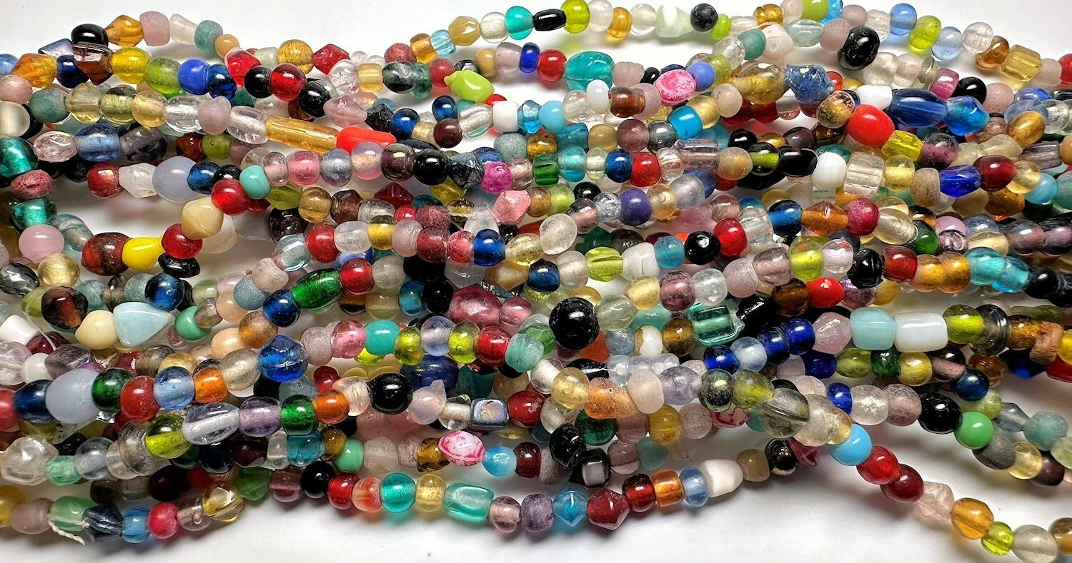 Multicolored beads on a white background
