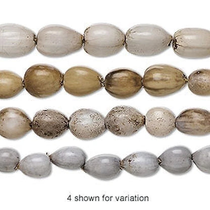 Two strands of beige and gray beads on a white background