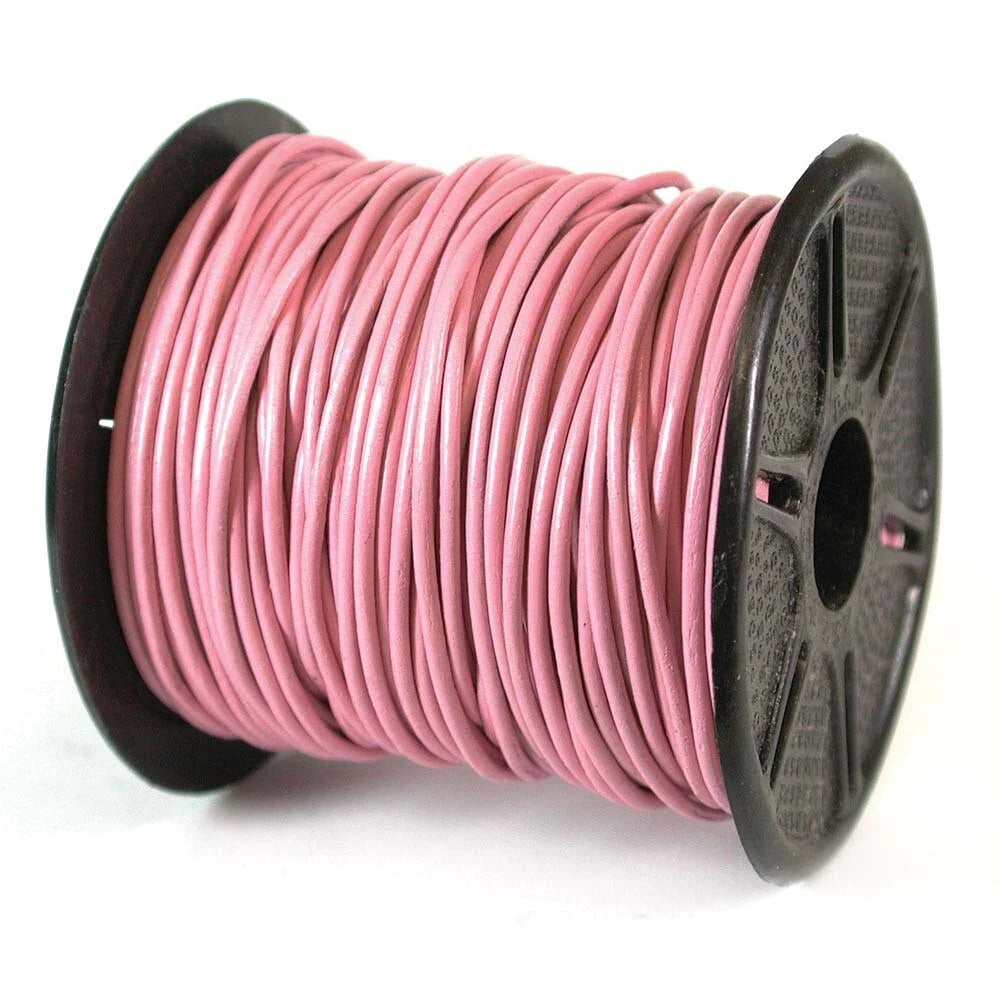 A spool of pink LEATHER wound tightly on a black plastic spool, photographed on a clean white background.
