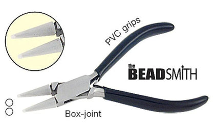 A pair of chain-nose pliers with black PVC grips and silver metal jaws, shown on a white background with an inset circle highlighting the PVC grip tips. Text labels read 'PVC grips', 'Box-joint', and the brand 'the BEADSMITH'.