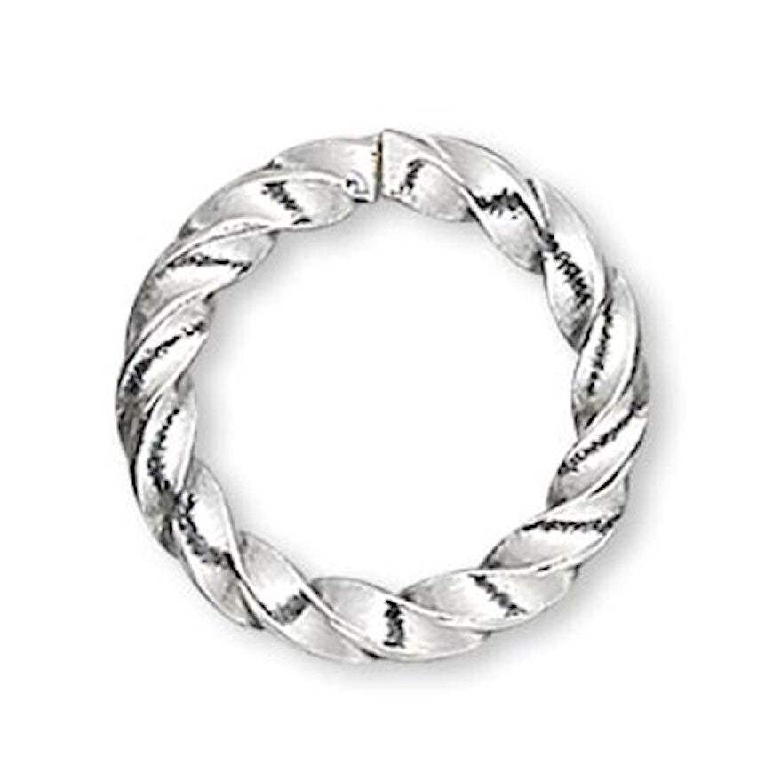 Silver twisted ring on a white background