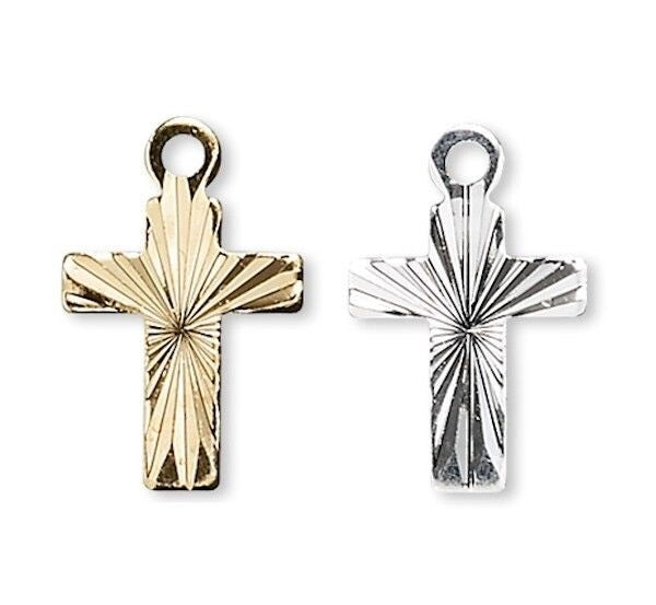 Gold and silver cross pendants on a white background