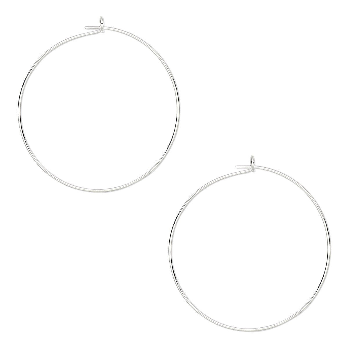 A pair of large, thin silver hoop earrings with small jump rings and post backings, displayed on a clean white background.
