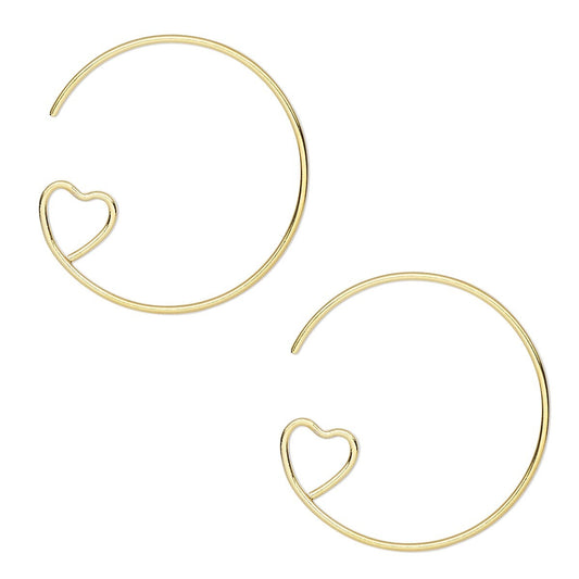 A pair of gold-toned open hoop earrings, each featuring a small heart-shaped cutout near the lower left curve, displayed on a clean white background.
