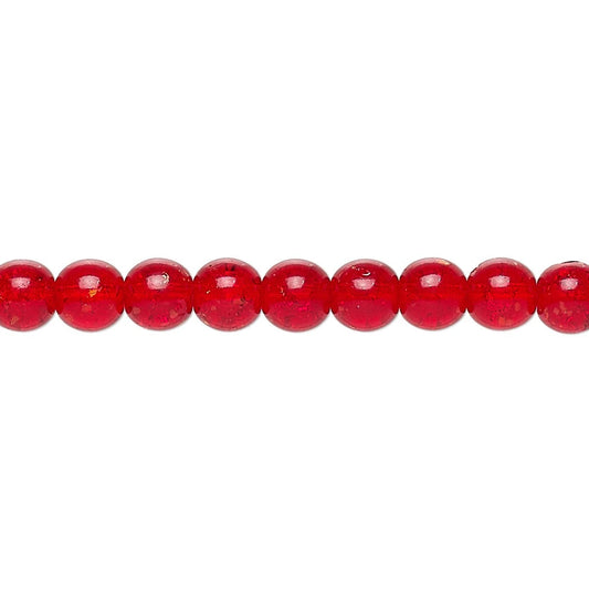 Row of red beads on a white background