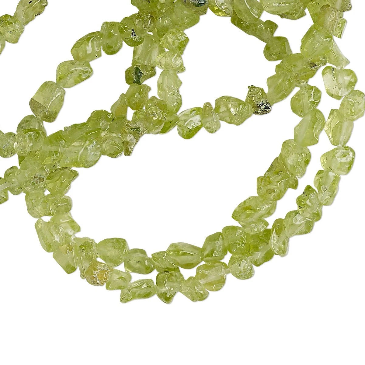 A strand of natural lime green gemstone beads, likely peridot, arranged in loose loops on a solid white background.