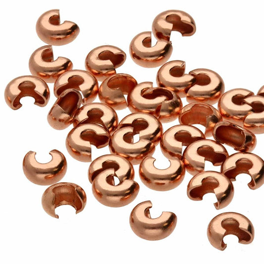 copper crimp covers on a white background