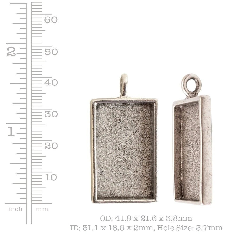Rectangular silver-toned jewelry pendant blank shown from front and side views on a white background, with a height ruler on the left and size text at the bottom.