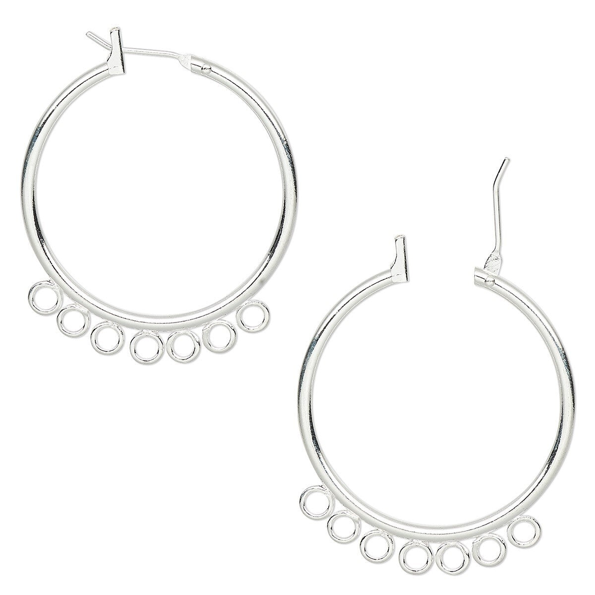 A pair of silver hoop earrings with a row of small dangling circular cutouts along the lower edge, shown on a plain white background.