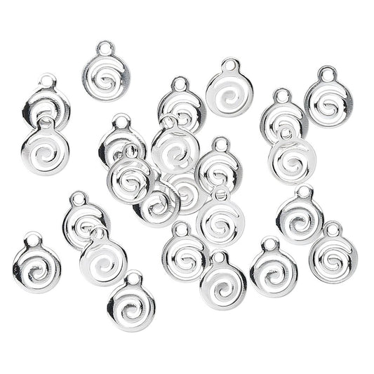 Multiple silver spiral-shaped jewelry charms with top loops, scattered on a plain white background.