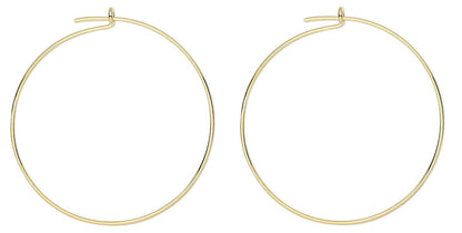 Gold hoop earrings on a white background