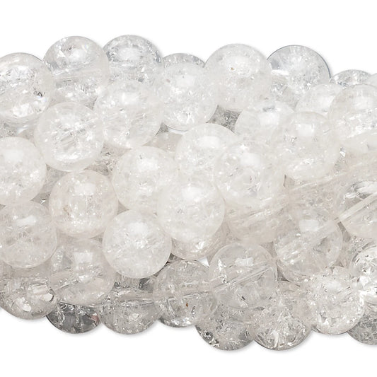 A close-up pile of clear, faceted round beads with a bubbly, frosted texture on a white background.