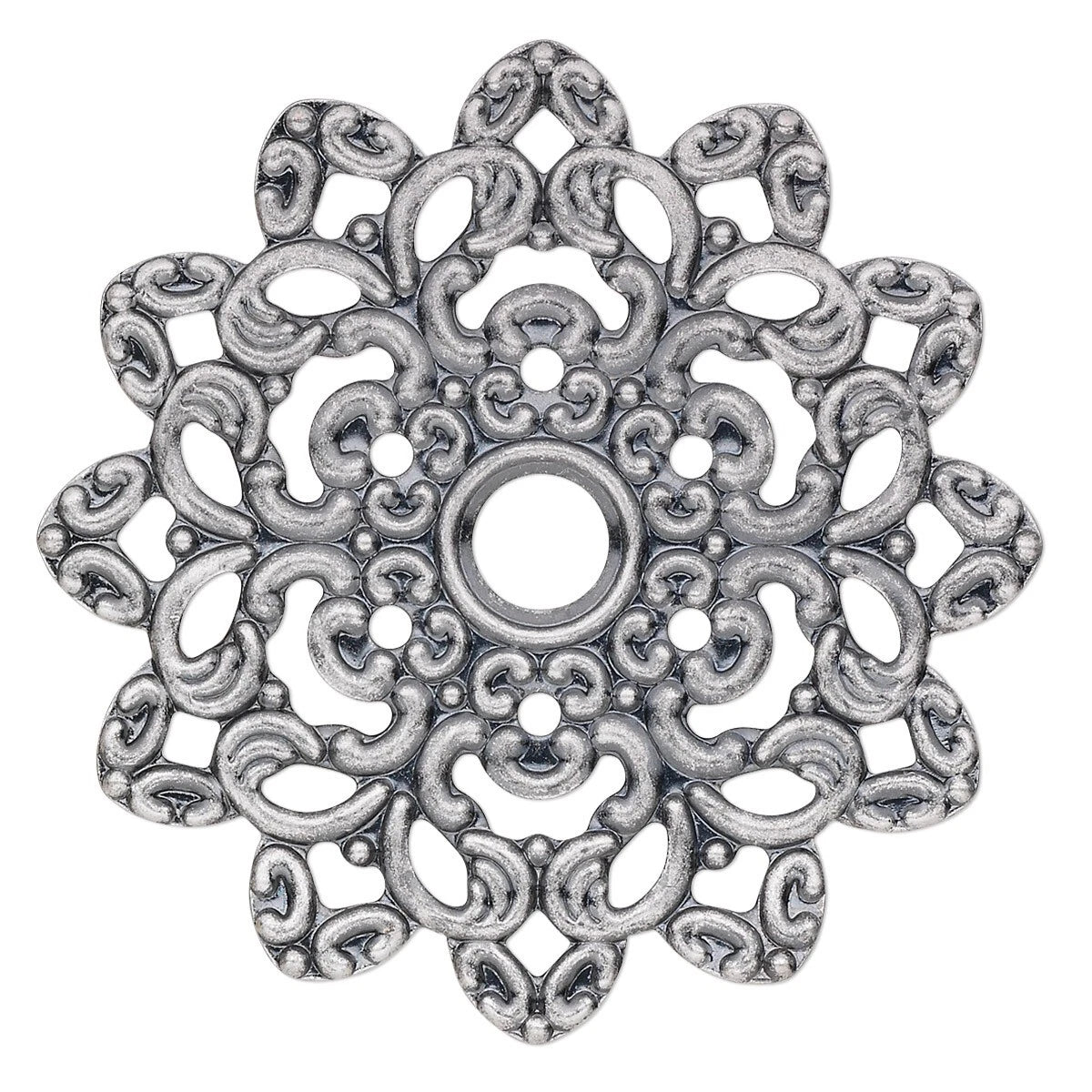 An ornate silver-toned metal filigree charm with a circular center hole and intricate scrollwork, shown on a plain white background.