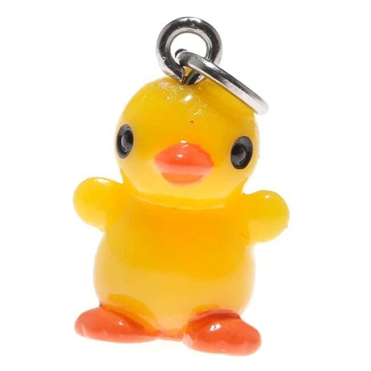 A small yellow rubber duck charm with an orange beak and feet, featuring black eyes and a silver metal ring at the top, shown against a plain white background.