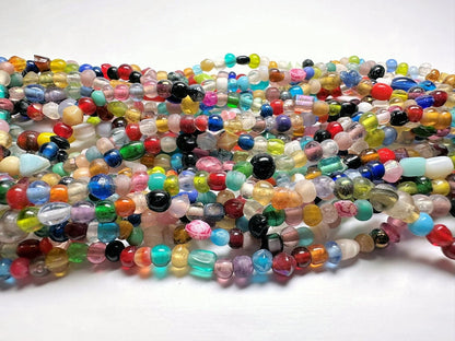 Multicolored beaded strands on a white background