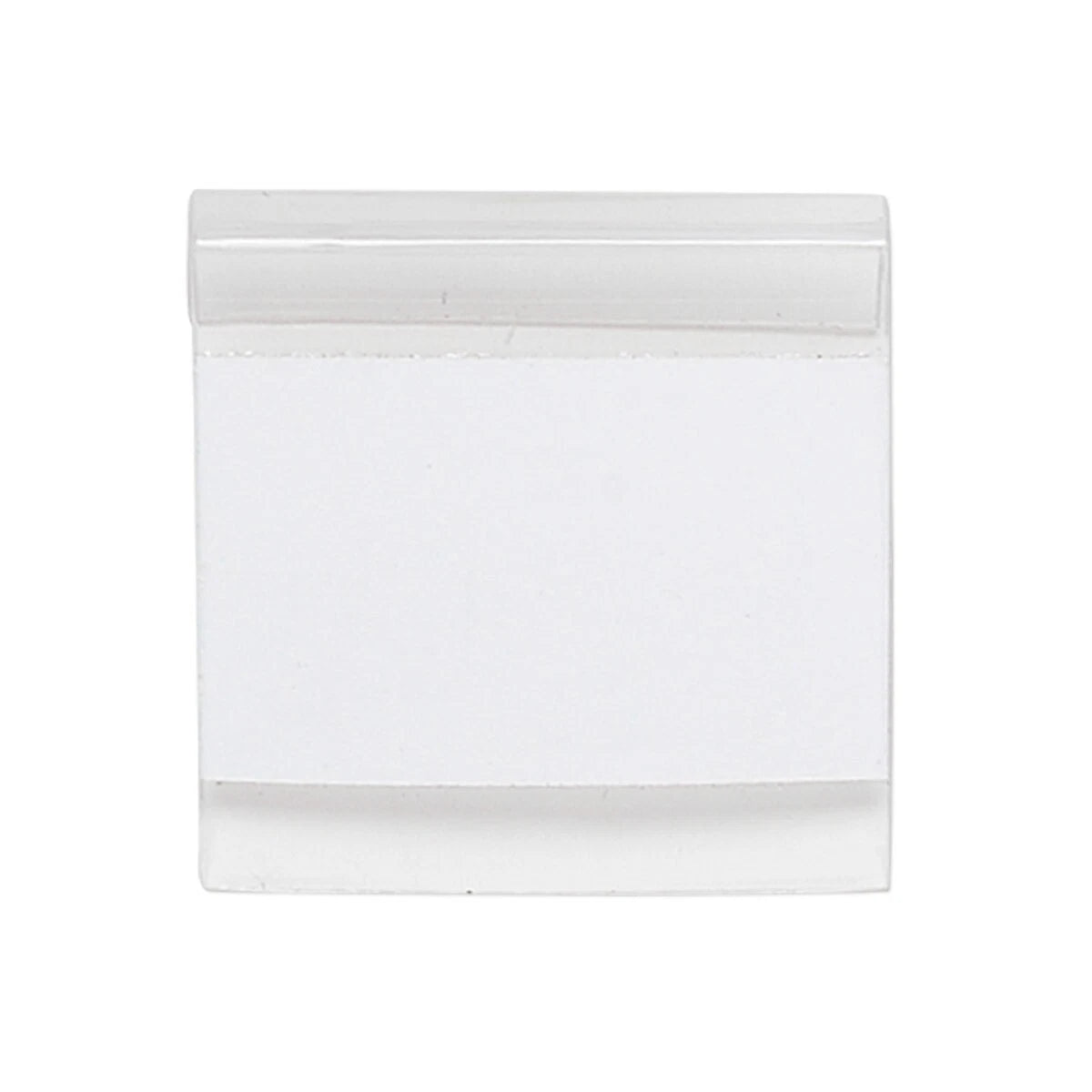 A blank white rectangular card or label with a clear plastic cover on a solid white background.