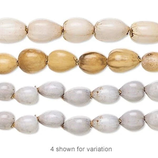 Three strands of beads in beige, brown, and white on a white background